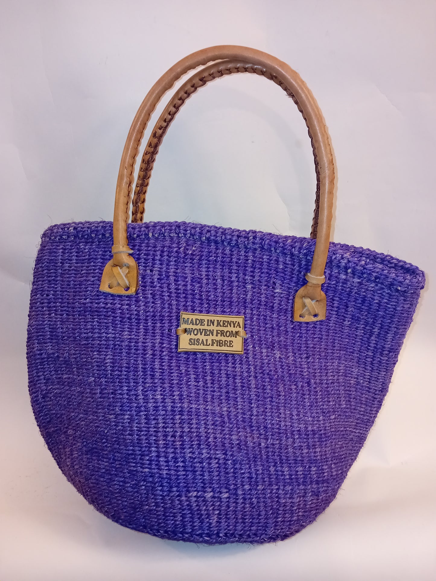 Small handbag style Handwoven Kenyan basket bag with leather handles