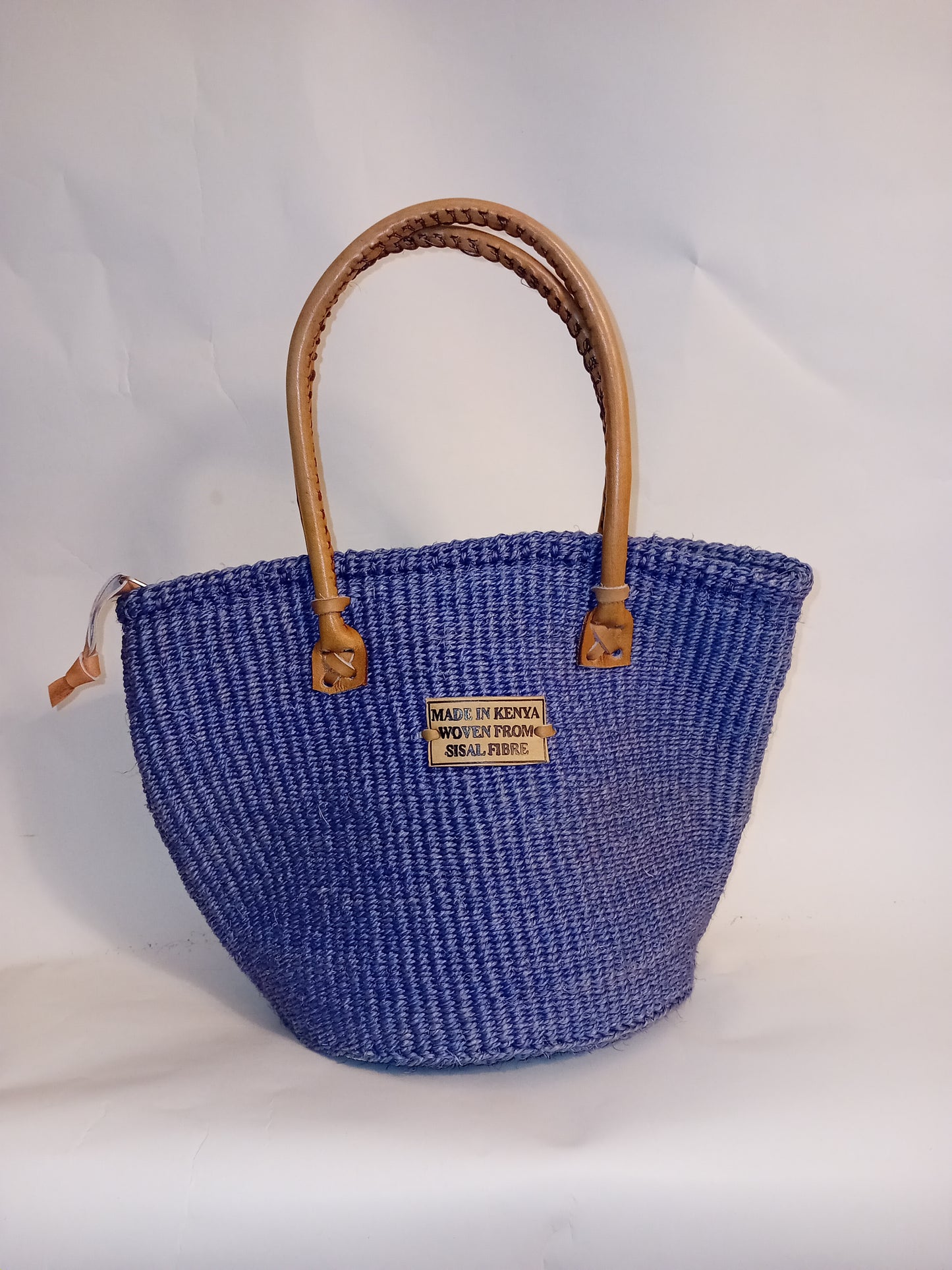 Small handbag style Handwoven Kenyan basket bag with leather handles