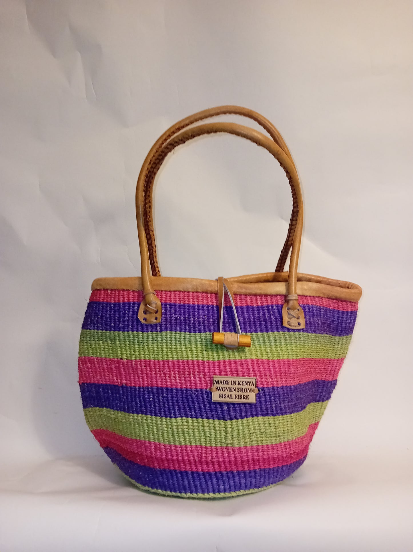 Multicoloured Handwoven Kenyan large basket bag with leather trim and toggle