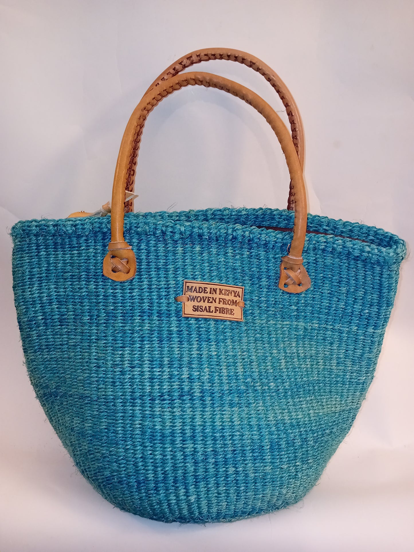 Small handbag style Handwoven Kenyan basket bag with leather handles