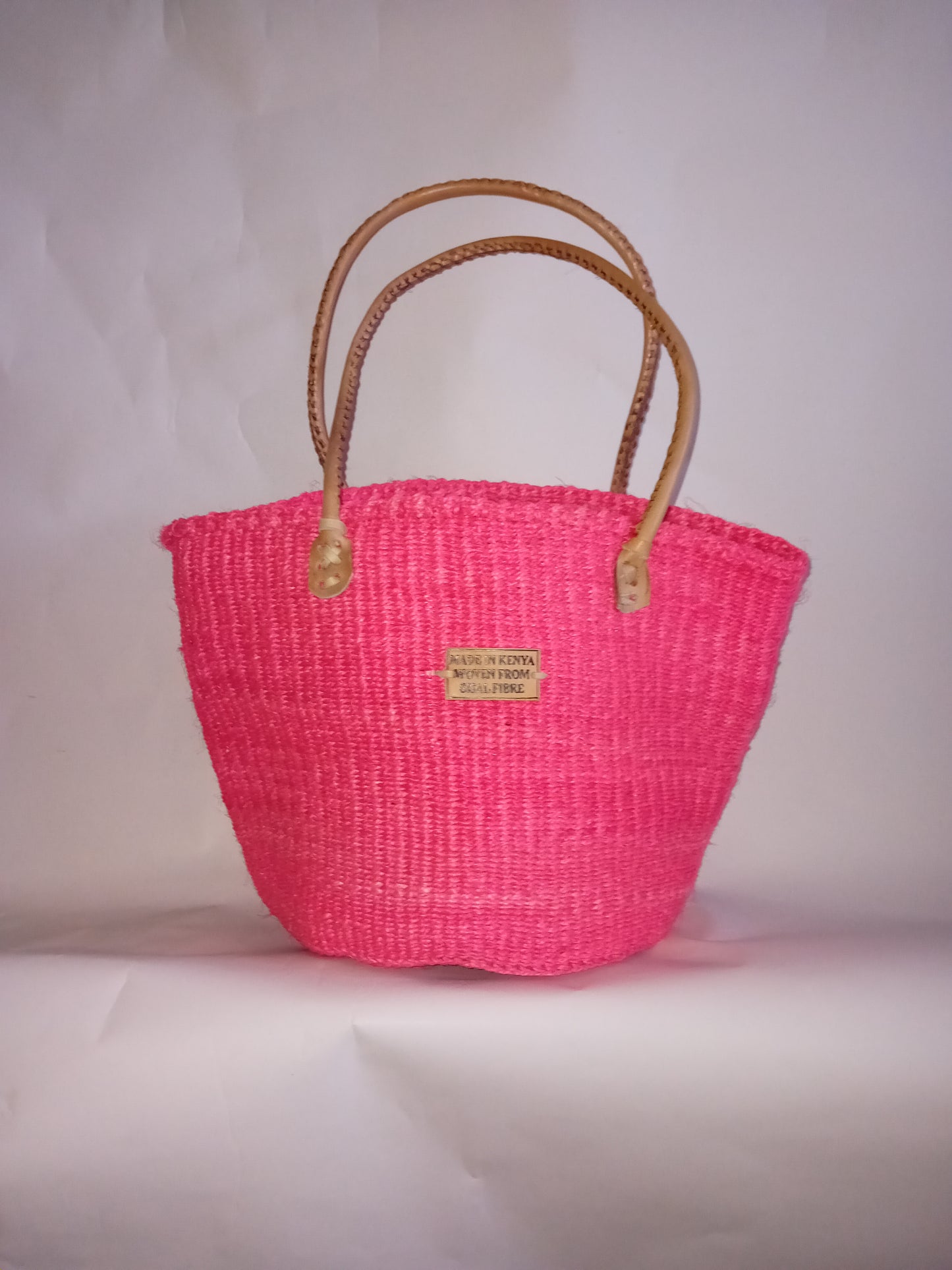 Small handbag style Handwoven Kenyan basket bag with leather handles