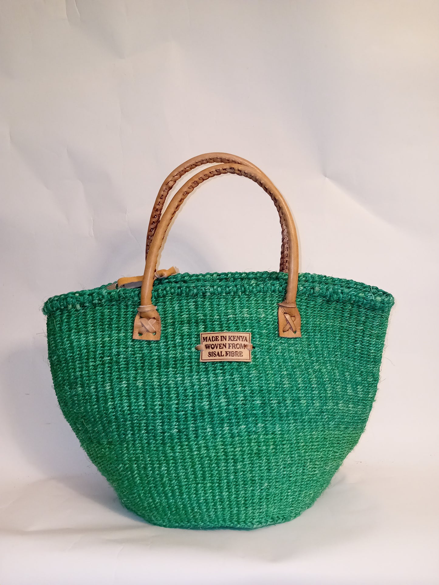 Small handbag style Handwoven Kenyan basket bag with leather handles and zip