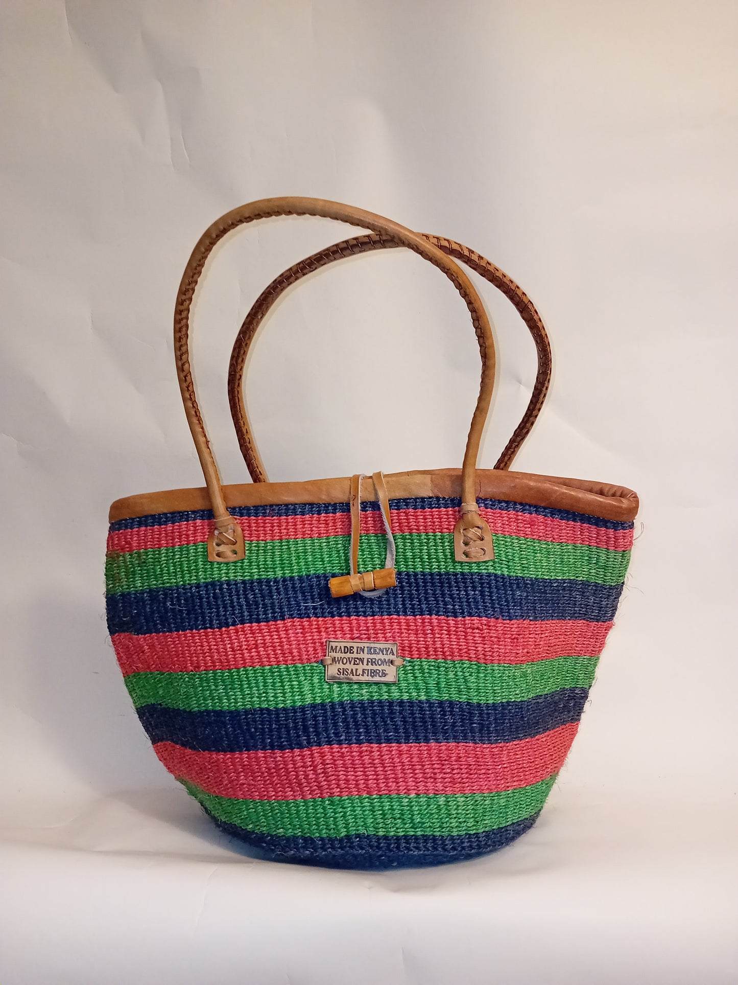 Multicoloured Handwoven Kenyan large basket bag with leather trim and toggle